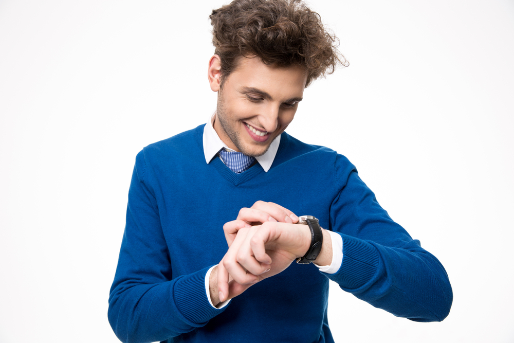 Businessman looking at his watch